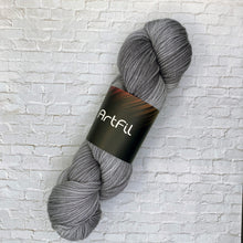 Load image into Gallery viewer, Gray skein of yarn with 'ArtFil' label on a white brick background