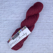 Load image into Gallery viewer, Red skein of yarn with &#39;Estelle Chunky&#39; label on a textured white background

