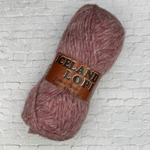 Load image into Gallery viewer, Ball of yarn with 'Iceland Lopi' label on a white brick background
