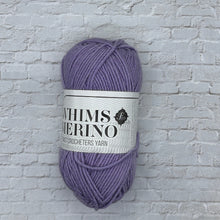 Load image into Gallery viewer, Ball of purple yarn with a label on a textured gray background
