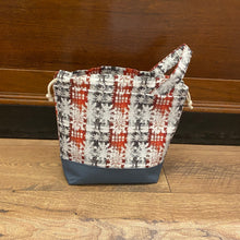 Load image into Gallery viewer, Patterned bag with blue base on wooden floor
